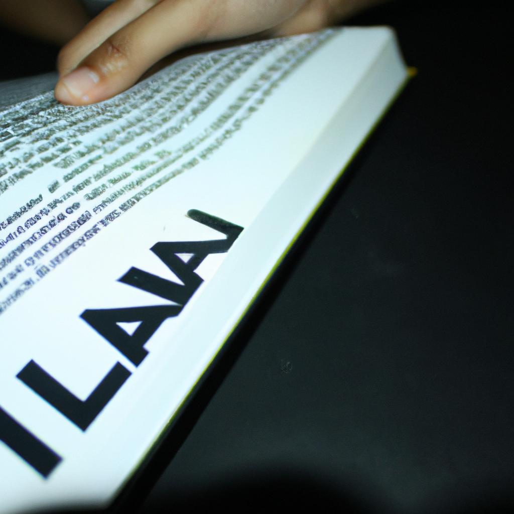 Person holding law book, studying